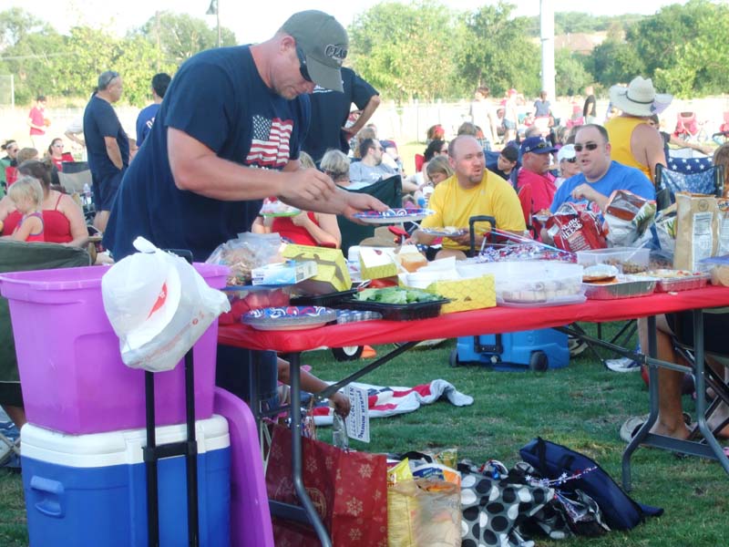 photo of people eating food at the July 4, 2012 Concert and Fireworks Show